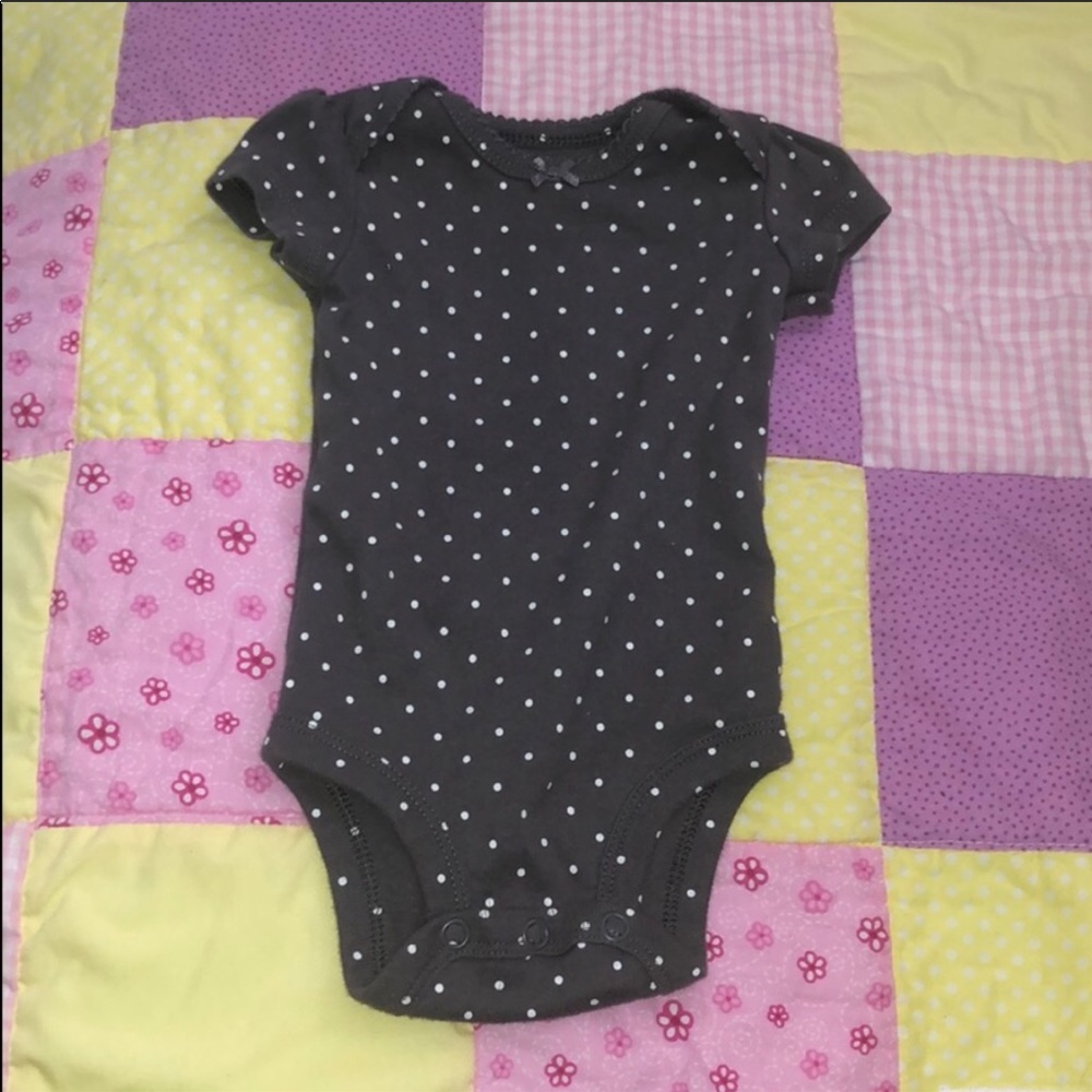 Navy blue onesie and polka dot onesie
